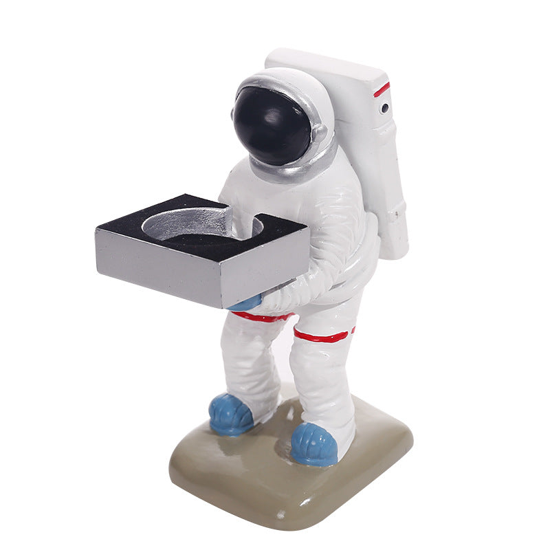 Innovative Astronaut-Themed Wireless Watch Charger Stand