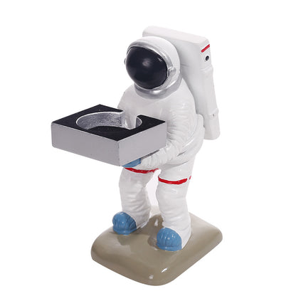 Innovative Astronaut-Themed Wireless Watch Charger Stand